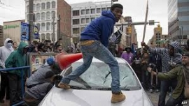 Scenes of Chaos in Baltimore as Thousands Protest Freddie Gray’s Death