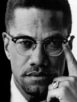 Today is Malcolm X Day. Why don’t we celebrate him like King?